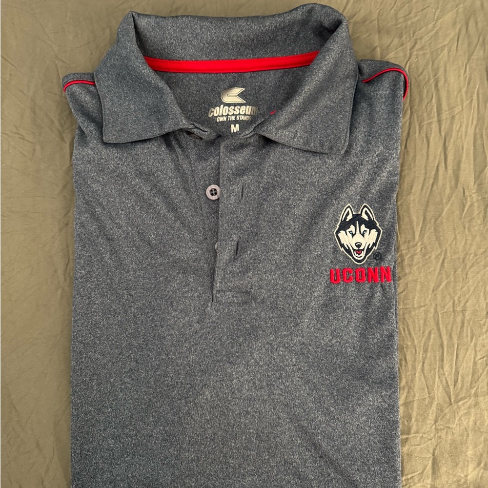 Colosseum Uconn gray/blue Polo with Crimson Details